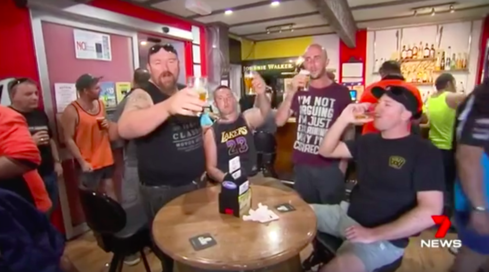 Punters enjoying a cold – and free – beer at Adelaide pub The Red Lion as temperatures skyrocketed. Source: 7News