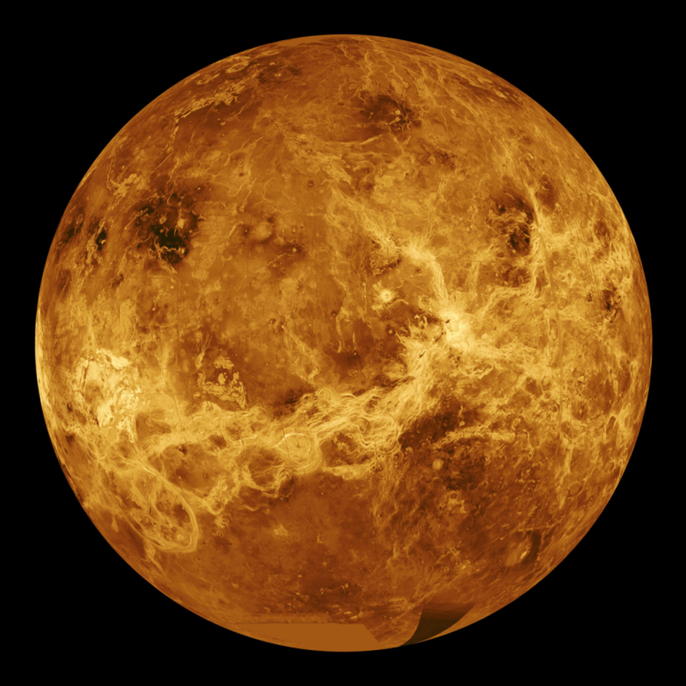 <span class="caption">Visible-wavelength light is unable to penetrate the thick cloud layer on Venus. Instead, radar is required to view the surface from space. This is a global radar image mosaic of the planet, compiled with data returned by the Magellan mission.</span> <span class="attribution"><span class="source">SSV/MIPL/MAGELLAN TEAM/NASA</span></span>