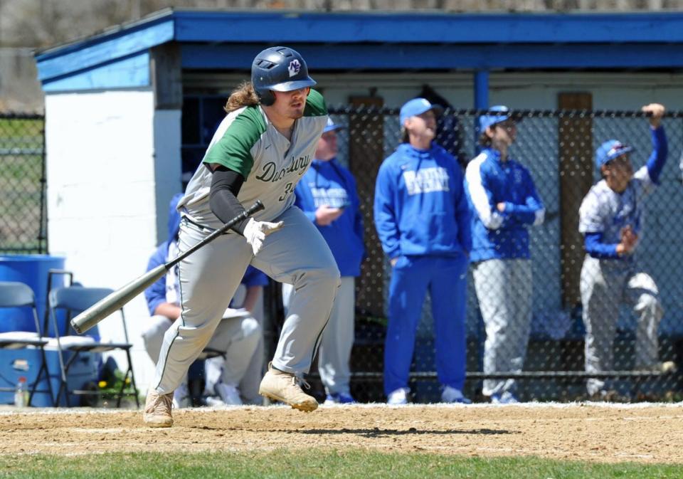 Duxbury's Nick Ayres races to first during high school baseball action at Braintree High School, Monday, April 18, 2022.