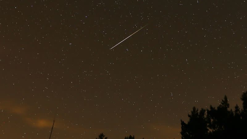 In this long exposure photo, a streak appears in the sky during the annual Perseid meteor shower at the Guadarrama mountains, on Aug. 12, 2016. The Taurid meteor shower peaks this week.