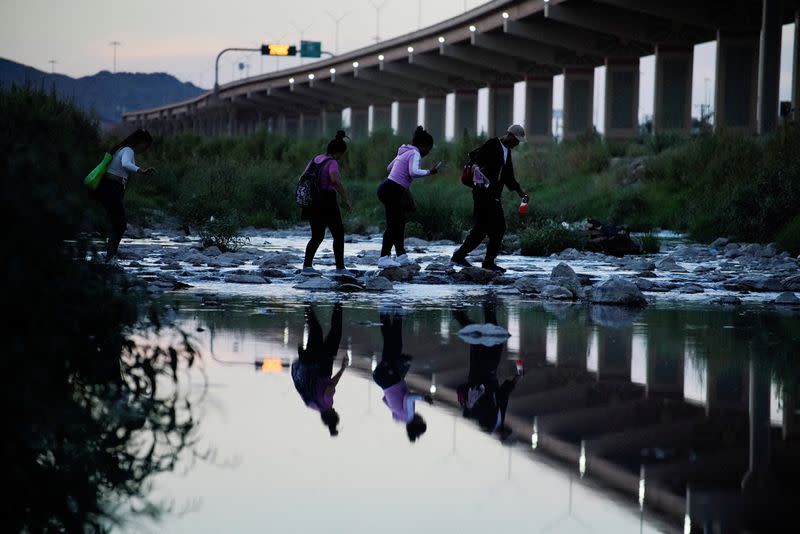 FILE PHOTO: Migrants continue to cross the border to El Paso