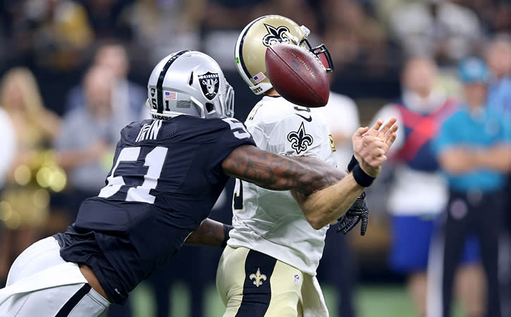 Sep 11, 2016; New Orleans, LA, USA; Oakland Raiders linebacker Bruce Irvin (51) strips the ball from New Orleans Saints quarterback Drew Brees (9) in the first quarter at the Mercedes-Benz Superdome. Mandatory Credit: Chuck Cook-USA TODAY Sports
