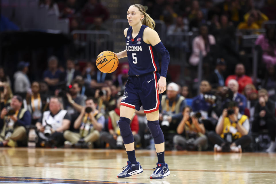 CLEVELAND, OHIO - APRIL 5: Paige Bueckers #5 of the UConn Huskies dribbles against the Iowa Hawkeyes during the NCAA Women's Basketball Tournament Final Four semifinal game at Rocket Mortgage Fieldhouse on April 5, 2024 in Cleveland, Ohio. (Photo by C. Morgan Engel/NCAA Photos via Getty Images)