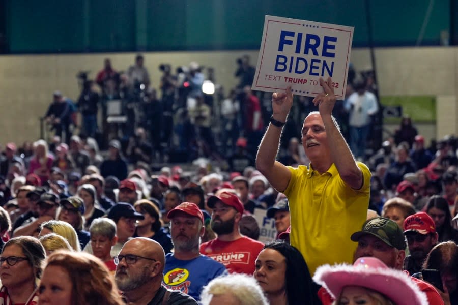 A supporter holds a sign as Republican presidential candidate former President Donald Trump speaks at a campaign rally Saturday, March 2, 2024, in Greensboro, N.C. (AP Photo/Chris Carlson)