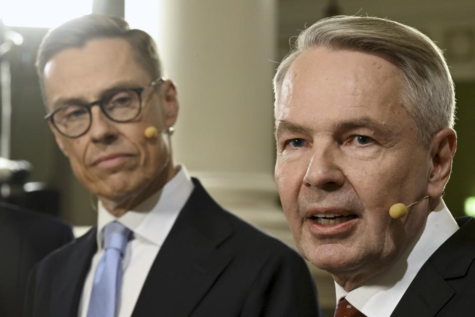 The two candidates with the most preliminary votes, National Coalition Party candidate Alexander Stubb, right, and Social Movement candidate Pekka Haavisto stand during a Presidential election event, at the Helsinki City Hall, in Helsinki, Finland, Sunday, Jan. 28, 2024. A projection in Finland says Alexander Stubb has won the first round of the presidential election to set up a Feb 11 runoff. ((Markku Ulander/Lehtikuva via AP)