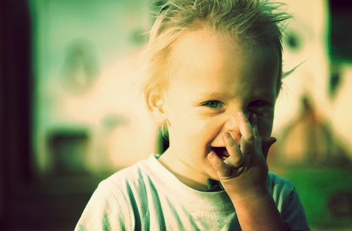 toddler boy laughing