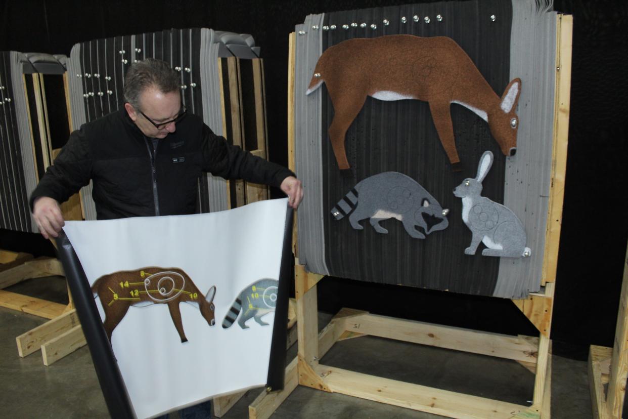 Al Jeske of West Town Archery organized targets and a scoring diagram on the competitive archery range at the 2020 Milwaukee Journal Sentinel Sports Show. The 2022 show will once again feature a West Town Archery Tournament Series, including a pro-am event and bowhunter competitions for youth and adults.