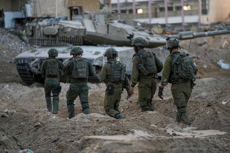 Israeli soldiers are seen during a ground operation in the Gaza Strip, Wednesday, Nov. 8, 2023.