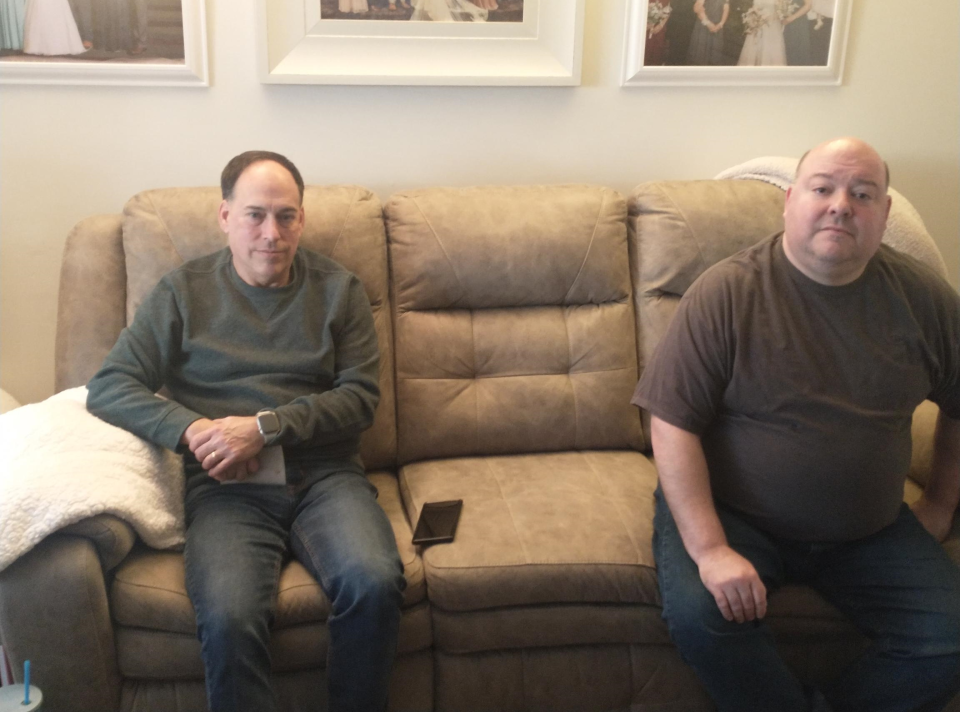 Michael Wurmlinger and his brother, Joe Wurmlinger, at his home on Nov. 19, 2023. Joe works for Warren Trucking, also owned by Stellantis. He hopes to continue until 2042, which would mark 100 years of family history with Chrysler.
