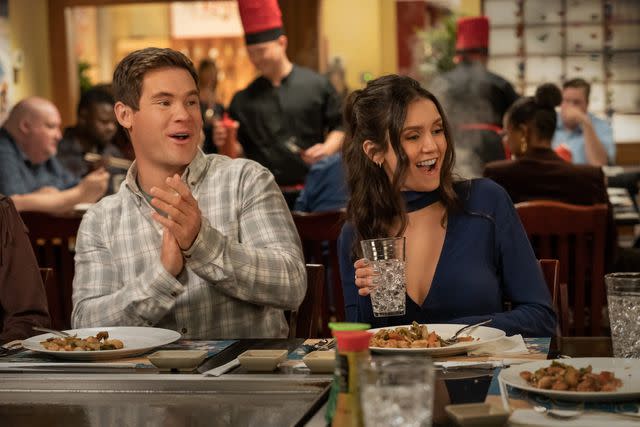 <p>Scott Yamano/Netflix </p> Adam Devine and Nina Dobrev in 'The Out-Laws,' 2023