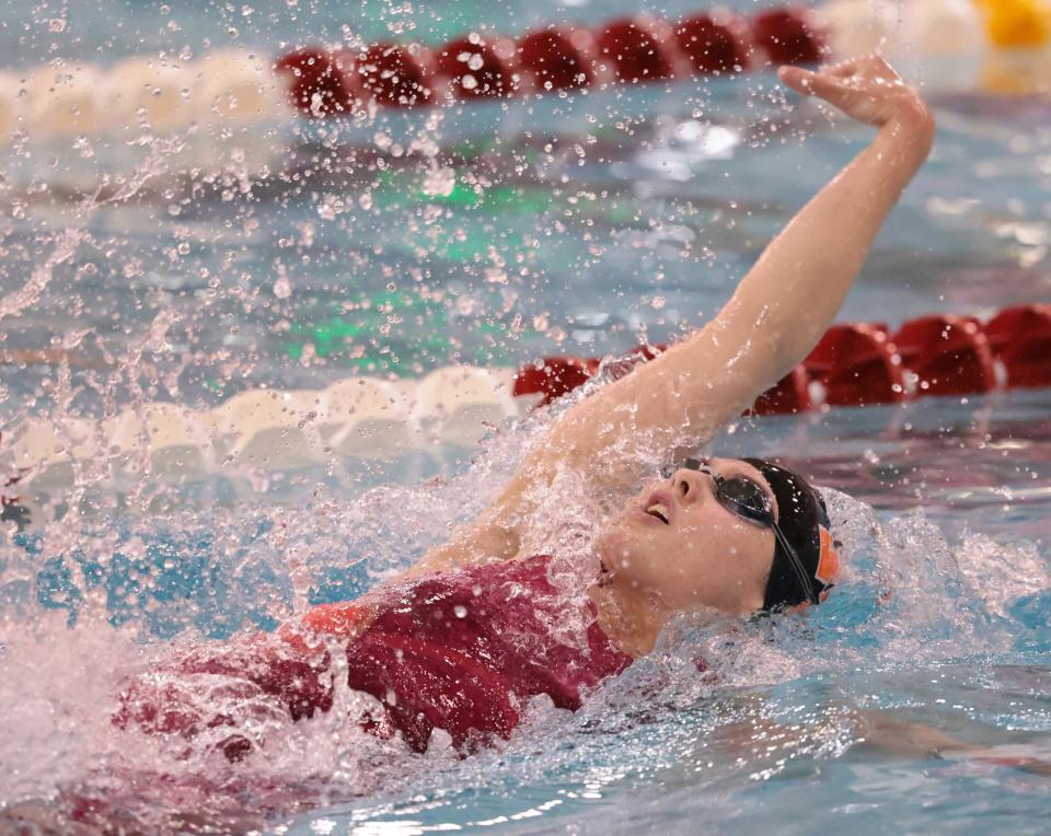 Marlington’s  Leah Guess competes in the 100 yard backstroke in the OHSAA Division II state meet prelims at Branin Natatorium, Thursday, Feb. 23, 2023.