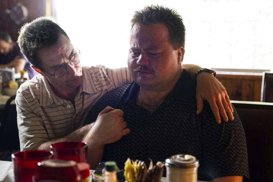 This image released by Warner Bros. Pictures shows Sam Rockwell, left, and Paul Walter Hauser in a scene from "Richard Jewell." (Claire Folger/Warner Bros. Pictures via AP)