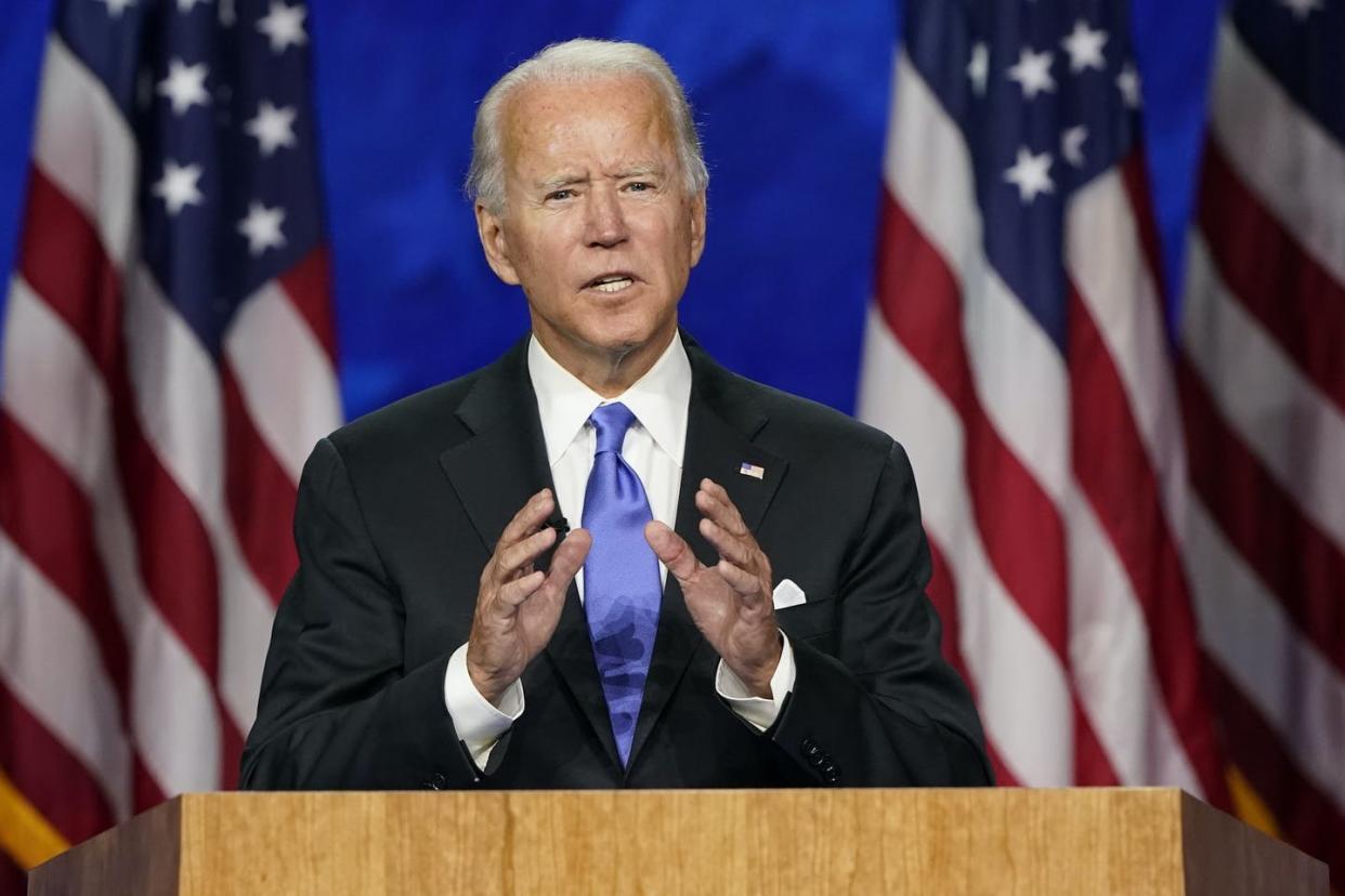 <span class="caption">Biden accepts the Democratic nomination on Aug. 20, 2020.</span> <span class="attribution"><a class="link " href="https://newsroom.ap.org/detail/Election2020DNC/45b3d8ca849e4c2695e16c188d8f6bf3/photo?Query=DNC%20AND%20Biden&mediaType=photo,video,graphic,audio&sortBy=&dateRange=Anytime&totalCount=112&currentItemNo=8" rel="nofollow noopener" target="_blank" data-ylk="slk:AP Photo/Andrew Harnik;elm:context_link;itc:0;sec:content-canvas">AP Photo/Andrew Harnik</a></span>