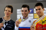 Cycling - UCI Track World Championships - Men's Omnium - Hong Kong, China – 15/4/17 - New Zealand's Aaron Gate, France's Benjamin Thomas, and Spain's Albert Torres celebrate with medals. REUTERS/Bobby Yip