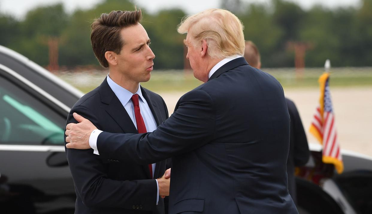 President Donald Trump greeted fellow Republican Josh Hawley in Springfield, Missouri, during Hawley's successful Senate campaign in that state. Hawley became a major player in Trump's bid -- based on lies -- to overturn Joe Biden's win in November's presidential election. Even after Trump incited a mob's attack on the U.S. Capitol last Wednesday, Hawley pressed the fraudulent effort to decertify election results. (Photo: MANDEL NGAN via Getty Images)