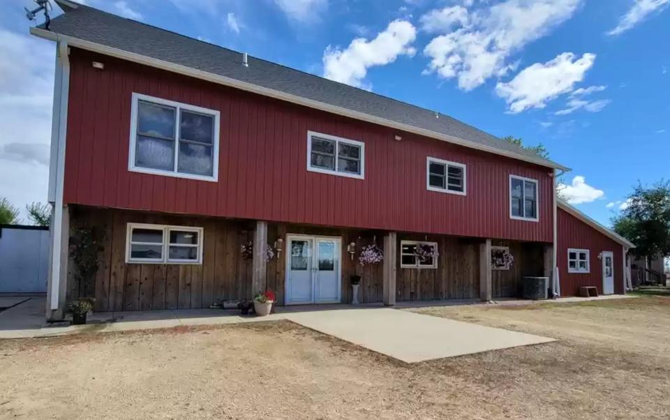 This converted 1890s barn is now a five-bedroom home in Winnebago that includes a sprawling deck that surrounds a 30-foot above-ground swimming pool.