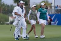 Apr 1, 2018; Rancho Mirage, CA, USA; Inbee Park and Pernilla Lindberg walk off the 18th green during the third playoff during the final round of the ANA Inspiration women's golf tournament at Mission Hills CC - Dinah Shore Tournament Course. Kelvin Kuo-USA TODAY Sports