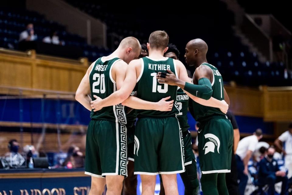 MIchigan State players huddle during the Champions Classic vs. Duke at Cameron Indoor Stadium in Durham, N.C. on Dec. 1, 2020.