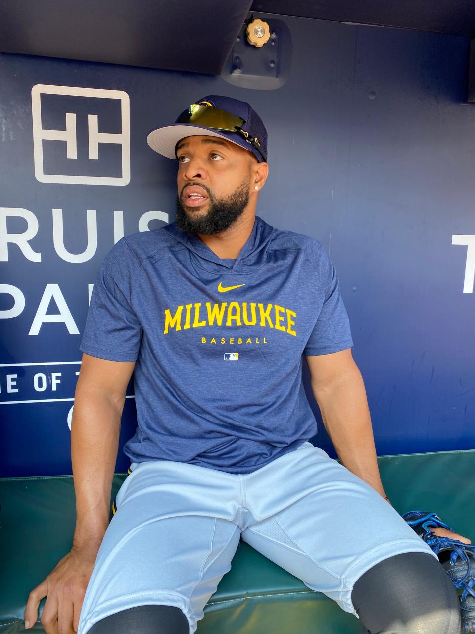 Milwaukee Brewers first baseman Carlos Santana meets with the media prior to his first game with the team after being traded from the Pittsburgh Pirates at Truist Park in Atlanta on July 29, 2023.