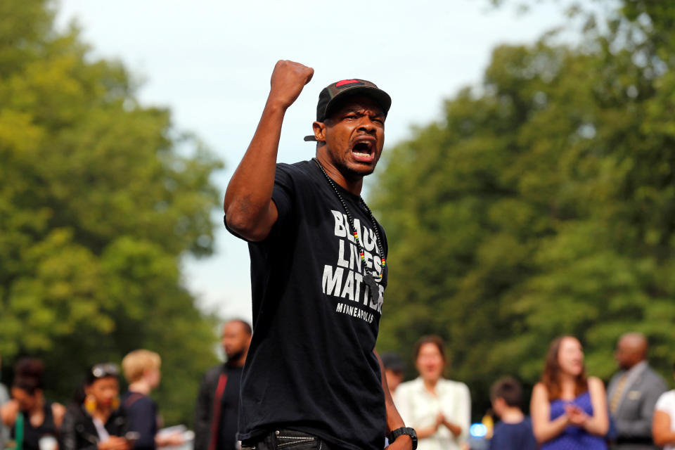 Marques Armstrong chants in support of Philando Castile in front of the governor's mansion in St. Paul, Minnesota.