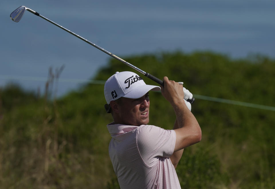 Justin Thomas, of the United States, watches his shot on the second tee on day three of the Hero World Challenge PGA Tour at the Albany Golf Club, in New Providence, Bahamas, Saturday, Dec. 4, 2021.(AP Photo/Fernando Llano)