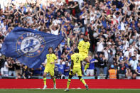 Chelsea's Ruben Loftus-Cheek, right, celebrates after scoring the opening goal during the English FA Cup semifinal soccer match between Chelsea and Crystal Palace at Wembley stadium in London, Sunday, April 17, 2022. (AP Photo/Ian Walton)