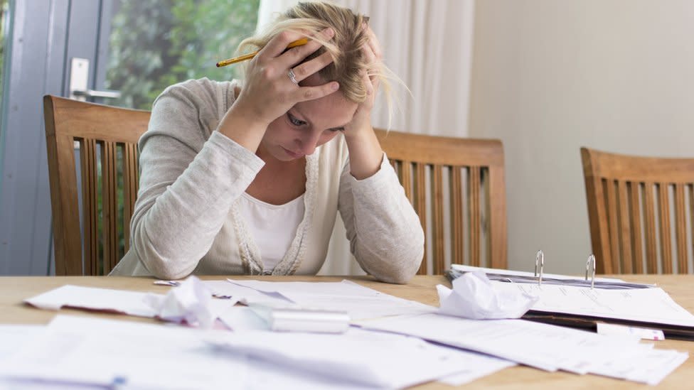 A woman going through her finances