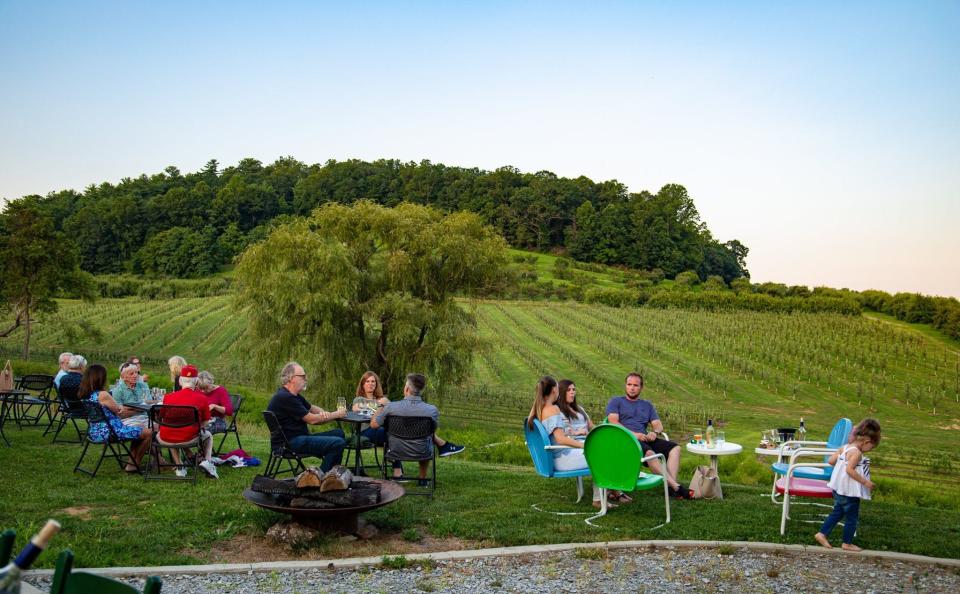 People enjoy wine at the Appalachian Ridge Winery, one of the participants in this year's Cider, Wine & Dine Weekend in Hendersonville.