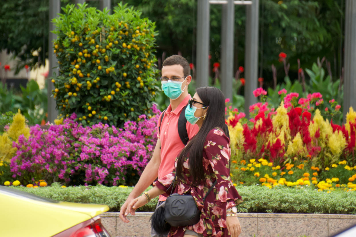 People seen wearing face masks along Orchard Road on 9 February 2020. (PHOTO: Dhany Osman / Yahoo News Singapore)