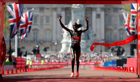 FILE PHOTO: Kenya's Vivian Cheruiyot wins the London Marathon, Britain - April 22, 2018. REUTERS/Paul Childs/File Photo