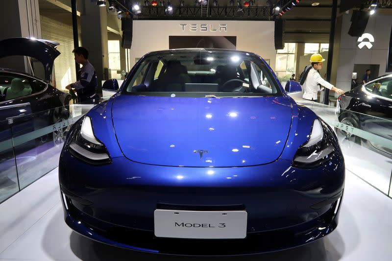 FILE PHOTO: China-made Tesla Model 3 electric vehicle is seen ahead of the Guangzhou auto show in Guangzhou