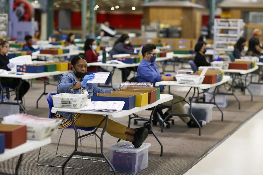 Industry, CA, Thursday, June 16, 2022 - Mail in ballots are processed at a County facility where they are received from the post office, opened, sorted and verified then sent to be counted in Downey. (Robert Gauthier/Los Angeles Times)