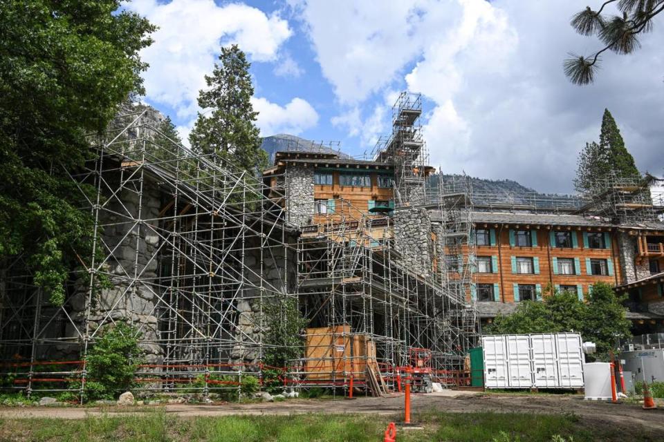 Scaffolding covers the Ahwahnee Hotel during construction on “structural enhancements” in Yosemite Valley on Tuesday, June 14, 2023. Construction is expected to be completed by the fall.