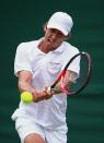 <p>John Millman of Australia plays a backhand during the Men’s Singles second round match against Benoit Pare of France on day four of the Wimbledon Lawn Tennis Championships at the All England Lawn Tennis and Croquet Club on June 30, 2016 in London, England. (Photo by Jordan Mansfield/Getty Images)</p>