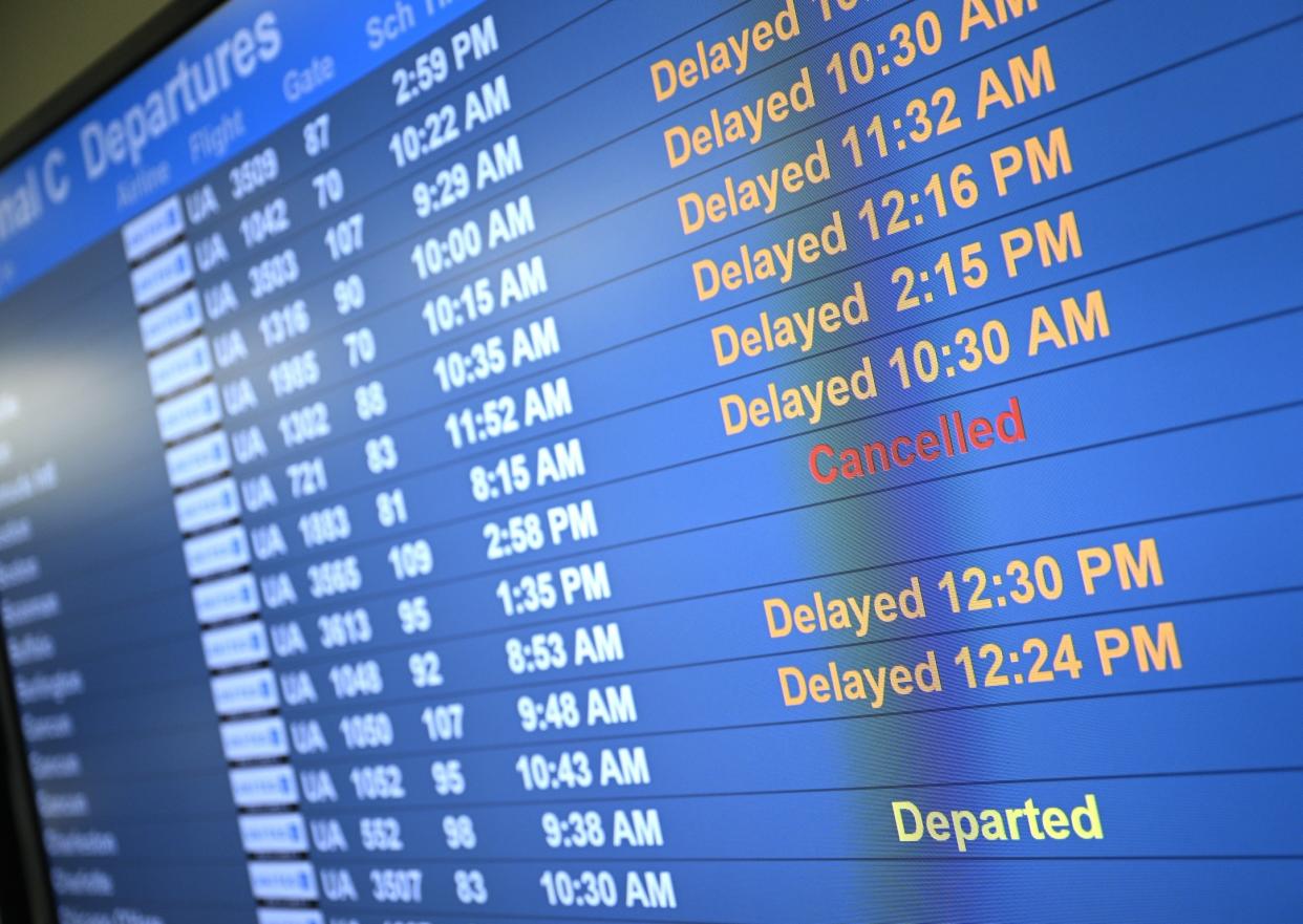 NEW JERSEY, UNITED STATES - JUNE 27: A screen shows canceled and delayed flights due to the nationwide storm at the Newark Liberty International Airport in New Jersey, United States on June 27, 2023. More than 2000 flights were canceled. (Photo by Fatih Aktas/Anadolu Agency via Getty Images)