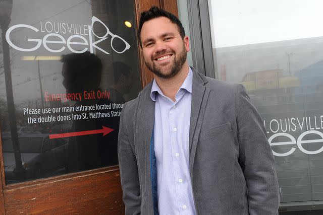 <p>Enid Alvarez/NY Daily News via Getty</p> Jennifer Lawrence's brother Ben Lawrence in front of his work building in Louisville, Kentucky.