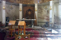 FILE - In this mobile phone camera image obtained by the Associated Press Tuesday, Nov. 2, 2010, the interior of the Our Lady of Salvation church is seen after gunmen took the congregation hostage on Sunday Oct 31. The attack, claimed by an al-Qaida-linked organization, was the deadliest recorded against Iraq's Christians since the 2003 U.S.-led invasion unleashed a wave of violence against them. (AP Photo)