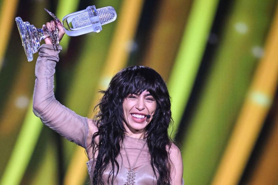 loreen holds the eurovision 2023 trophy after her win for sweden