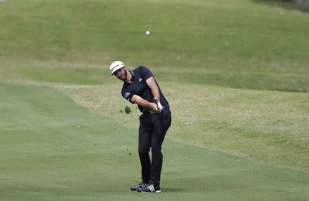 Mar 22, 2017; Austin, TX, USA; Dustin Johnson of the United States plays against Webb Simpson of the United States during the first round of the World Golf Classic - Dell Match Play golf tournament at Austin Country Club. Erich Schlegel-USA TODAY Sports