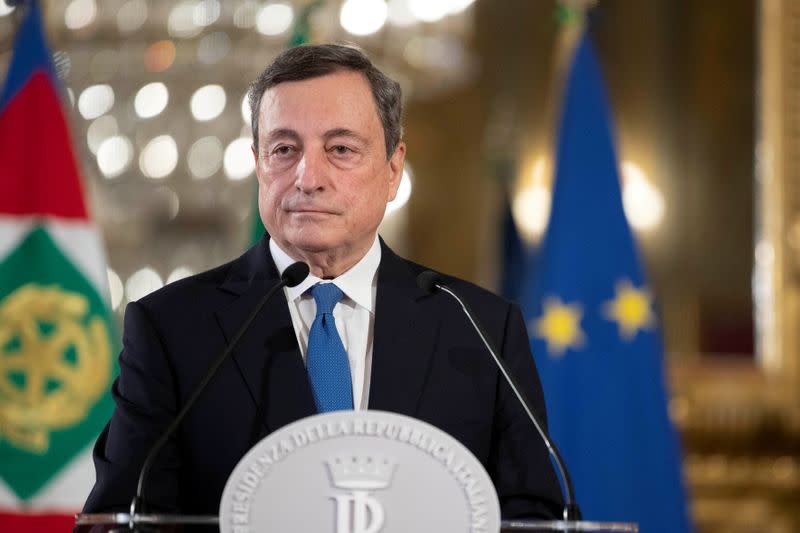 FILE PHOTO: Former European Central Bank President Mario Draghi pauses as he speaks after his meeting with Italian President Sergio Mattarella in Rome