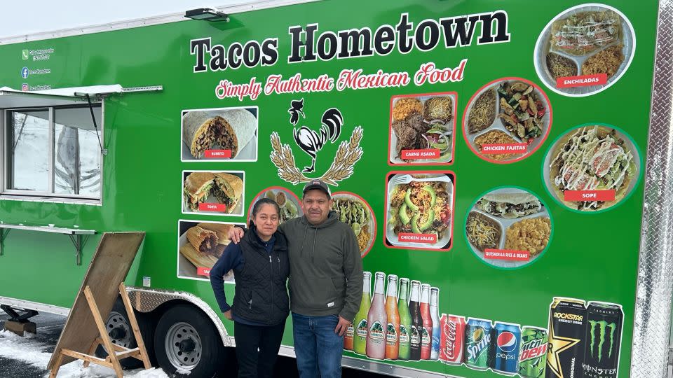 Elia and Amado Juarez stand in front of their taco truck in Morrow County, Oregon. - Elia and Amado Juarez