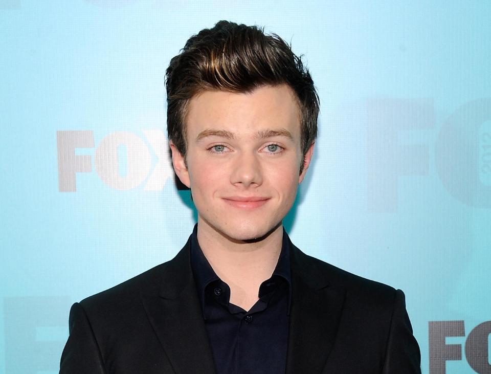 FILE - This May 14, 2012 file photo shows actor Chris Colfer from "Glee" attending the FOX network upfront presentation party in New York. Colfer written his own children's novel called “The Land of Stories” which is now in stores. The book is about twins Connor and Alex, who find themselves sucked into their favorite book of fairy tales, suddenly face-to-face with the characters they grew up reading about. Colfer said he came up with the idea as an inquisitive child who questioned the fairytales his mother would read to him. (AP Photo/Evan Agostini, file)