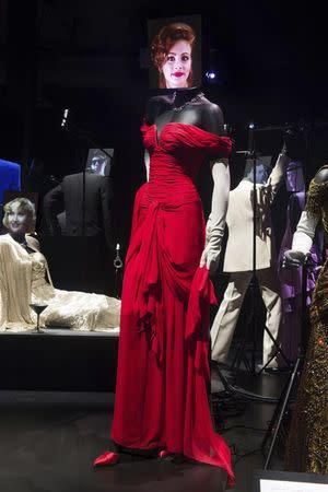 A costume worn by actress Julia Roberts in the film "Pretty Woman" is shown on display at the Hollywood Costume exhibit, curated by the Academy of Motion Pictures Arts and Sciences and London's Victoria & Albert museum, at the future home of the Academy Museum of Motion Pictures in Los Angeles, in this publicity photo released to Reuters on September 30, 2014. REUTERS/Greg Harbaugh/Copyright 2014 AMPAS/Handout via Reuters