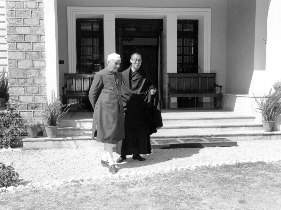 FILE - Indian Prime Minister Jawaharlal Nehru, left, visits the Dalai Lama, spiritual and temporal head of Tibet, at Birla House in the hill station of Mussoorie, India on April 24, 1959. The Dalai Lama fled Communist Chinese-controlled Tibet and is living in exile at Birla House. (AP Photo/File)