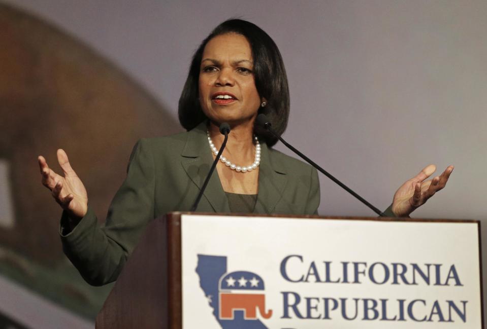 Former Secretary of State Condoleezza Rice gestures while speaking before the California Republican Party 2014 Spring Convention Saturday, March 15, 2014, in Burlingame, Calif. (AP Photo/Ben Margot)