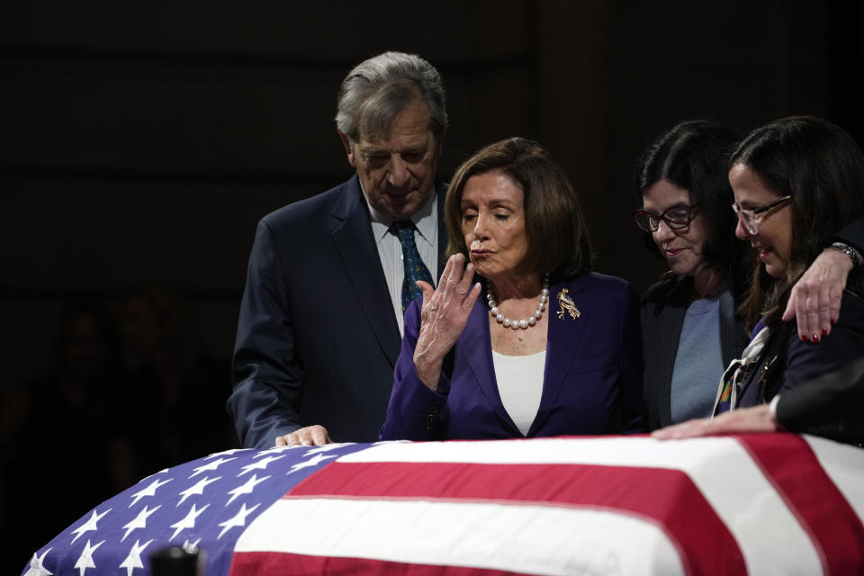 U.S. Rep. Nancy Pelosi, D-Calif. second from left, surrounded by her husband Paul, left, Katherine Feinstein, second from right, and daughter Nancy Pelosi, right, blows a kiss at the casket of U.S. Sen. Dianne Feinstein at the City Hall Wednesday, Oct. 4, 2023, in San Francisco. Feinstein, who died Sept. 29, served as San Francisco's mayor. (AP Photo/Godofredo A. Vásquez)