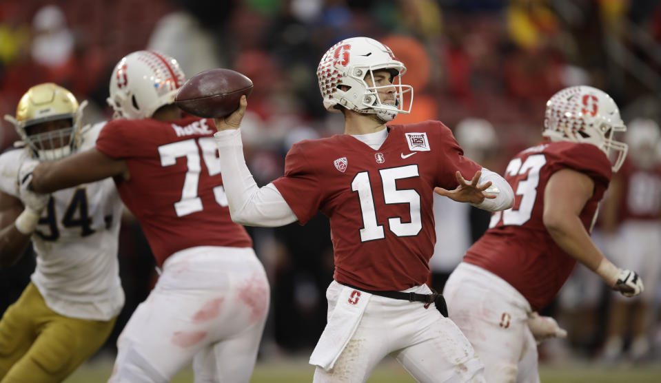 Stanford quarterback Davis Mills (15) passes against Notre Dame in the second half of an NCAA college football game Saturday, Nov. 30, 2019, in Stanford, Calif. (AP Photo/Ben Margot)