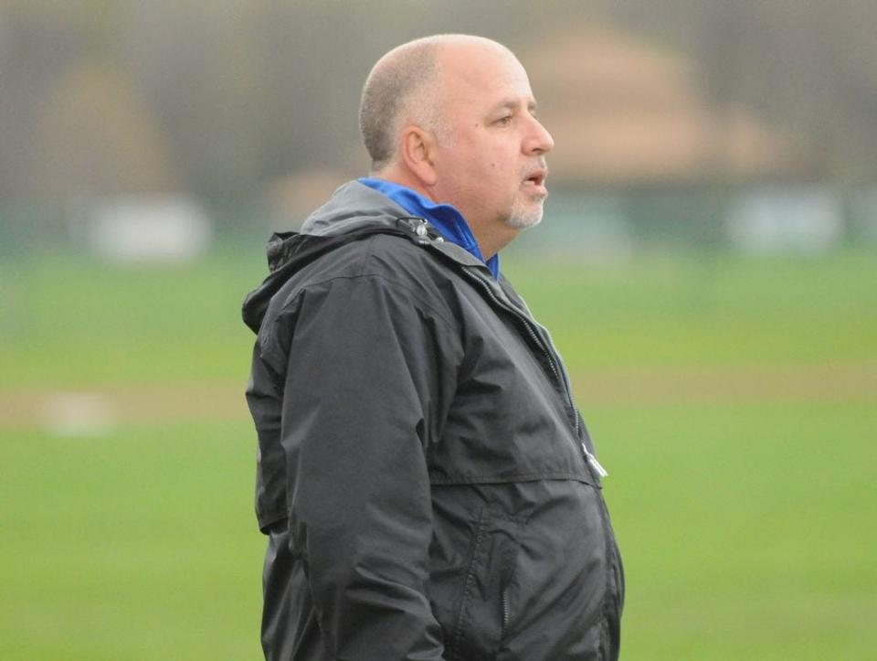 Adrian boys soccer coach Ted Hanosh led the Maples to 14 wins and has been named county Coach of the Year.