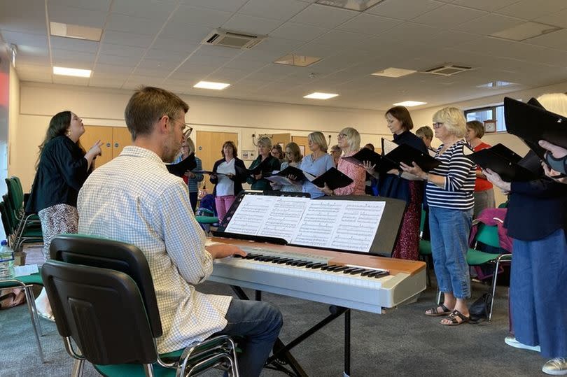 The choir rehearsing