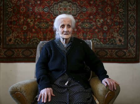 Silvard Atajyan, 103, sits at home during an interview with Reuters in Yerevan, April 20, 2015. REUTERS/David Mdzinarishvili